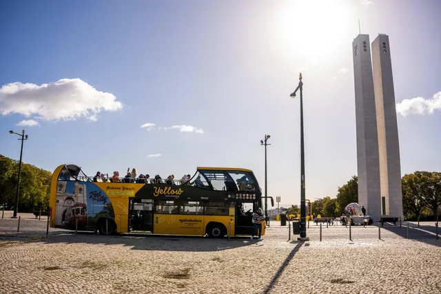 Hop-on hop-off bus tour Lisbon — boarding near Belém Tower