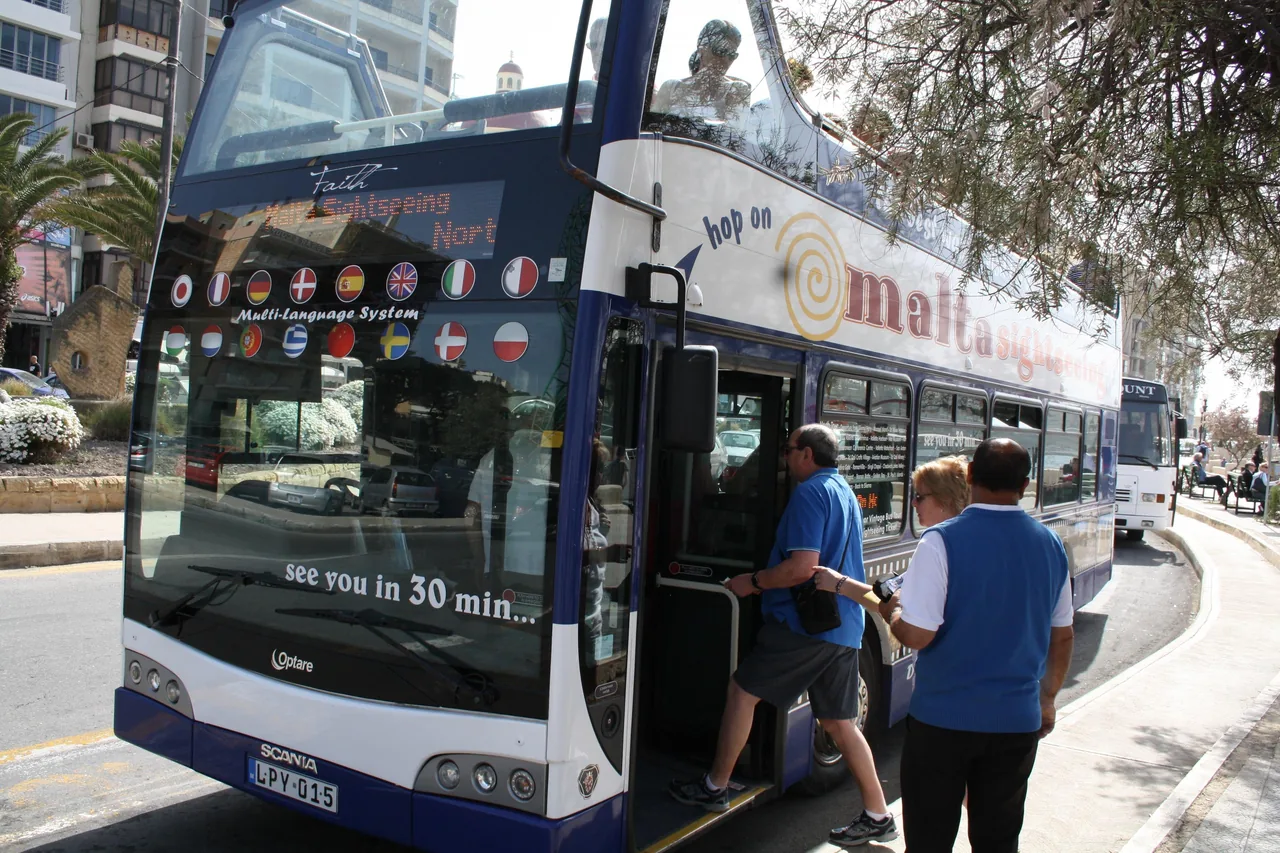 Hop-on hop-off bus tour in Malta passing Valletta