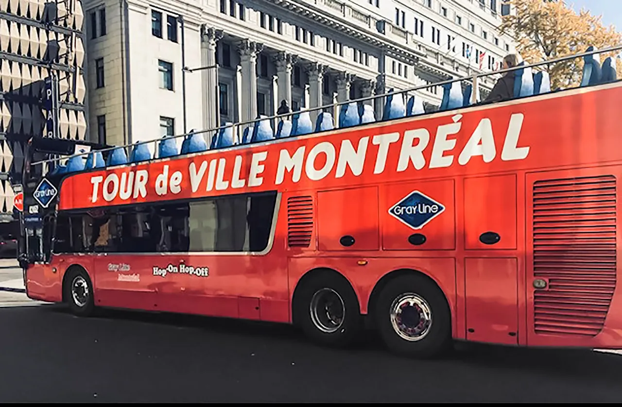 Hop-on hop-off bus tour in Montreal passing Old Montreal