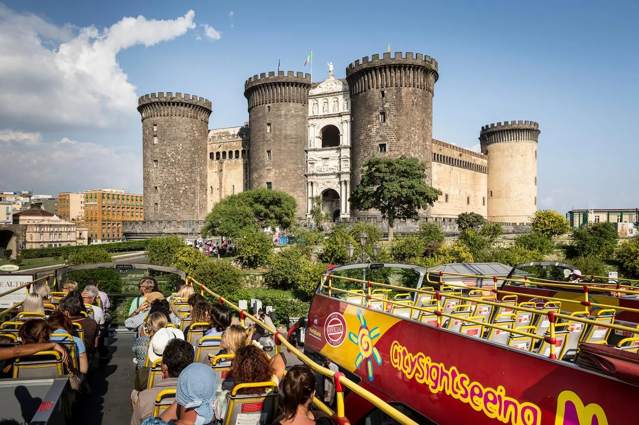 Hop-on hop-off bus tour in Naples passing the historic center