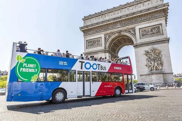 Hop-on hop-off bus tour Paris — boarding near the Eiffel Tower