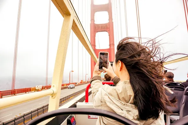 Hop-on hop-off bus tour San Francisco — boarding near the Golden Gate Bridge